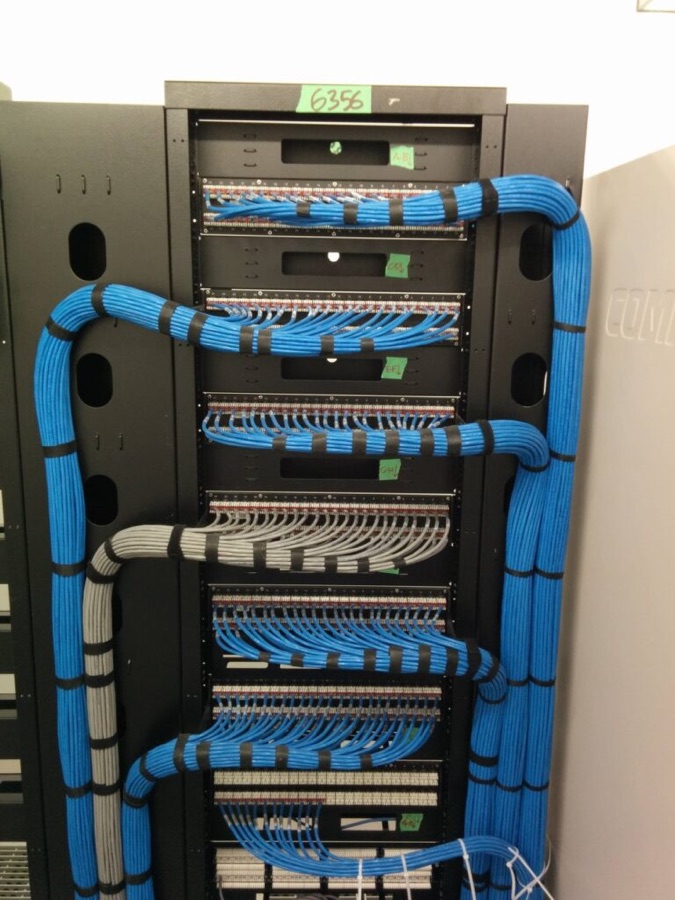 Blue Cat 6 cabling dressed into patch panels