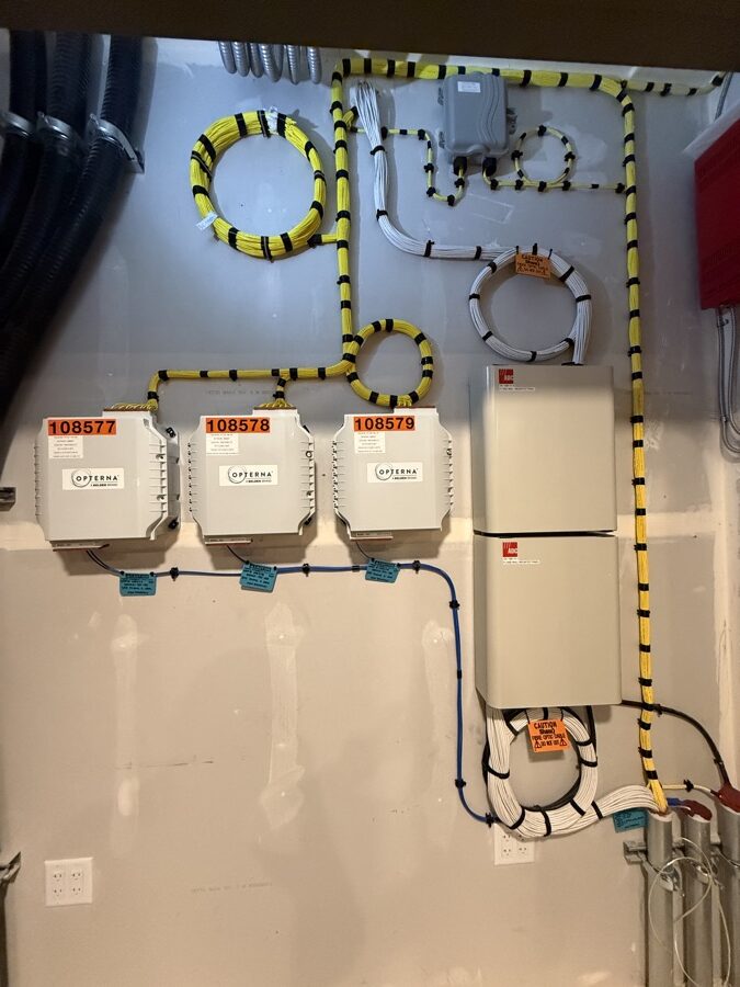 Fiber enclosures with dressed cable runs